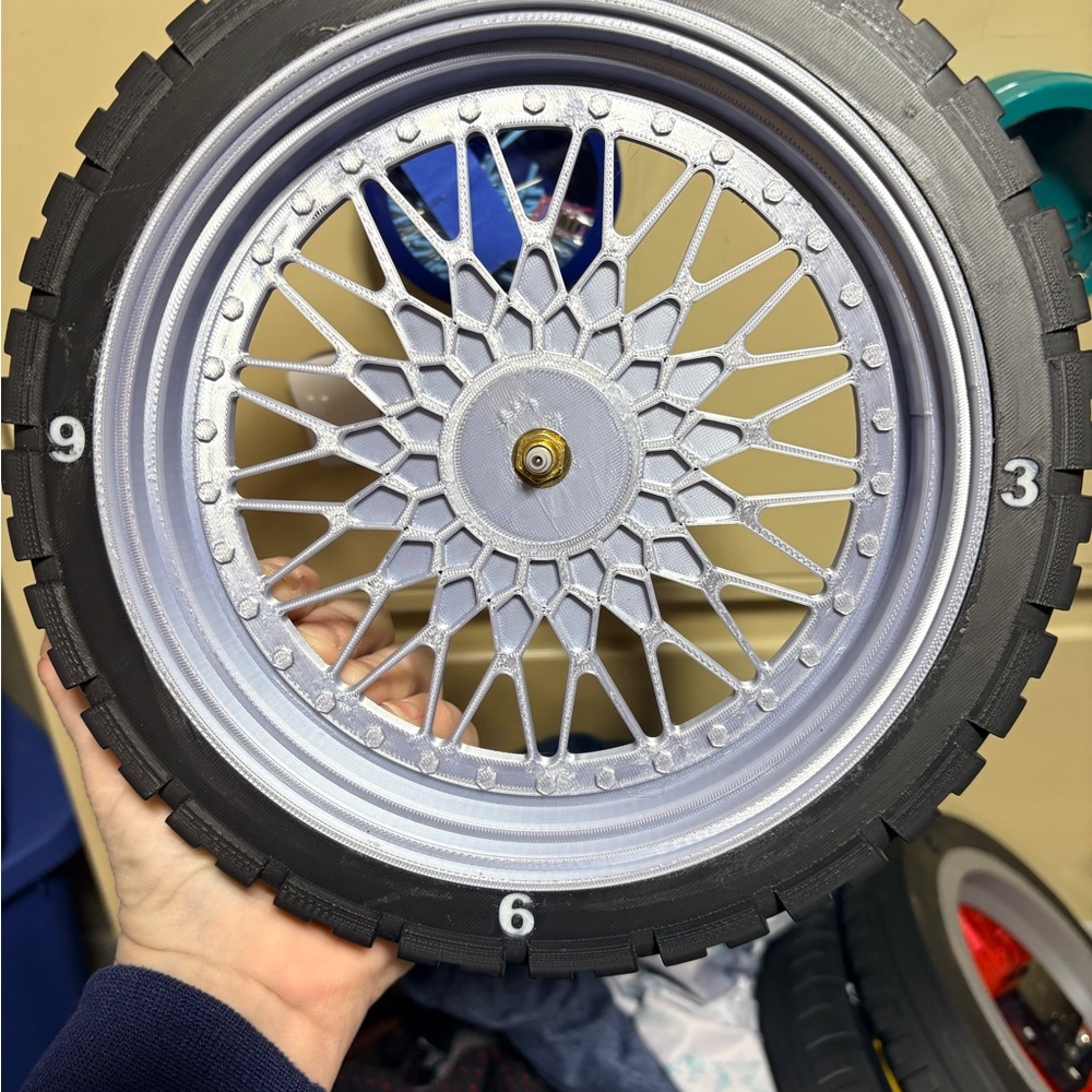 Black and Silver, red, or Gold Decorative Wheel wall clocks